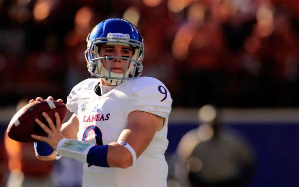 Jake Heaps often struggled in his only season as Kansas' starting quarterback. (Stacy Revere/Getty Images)